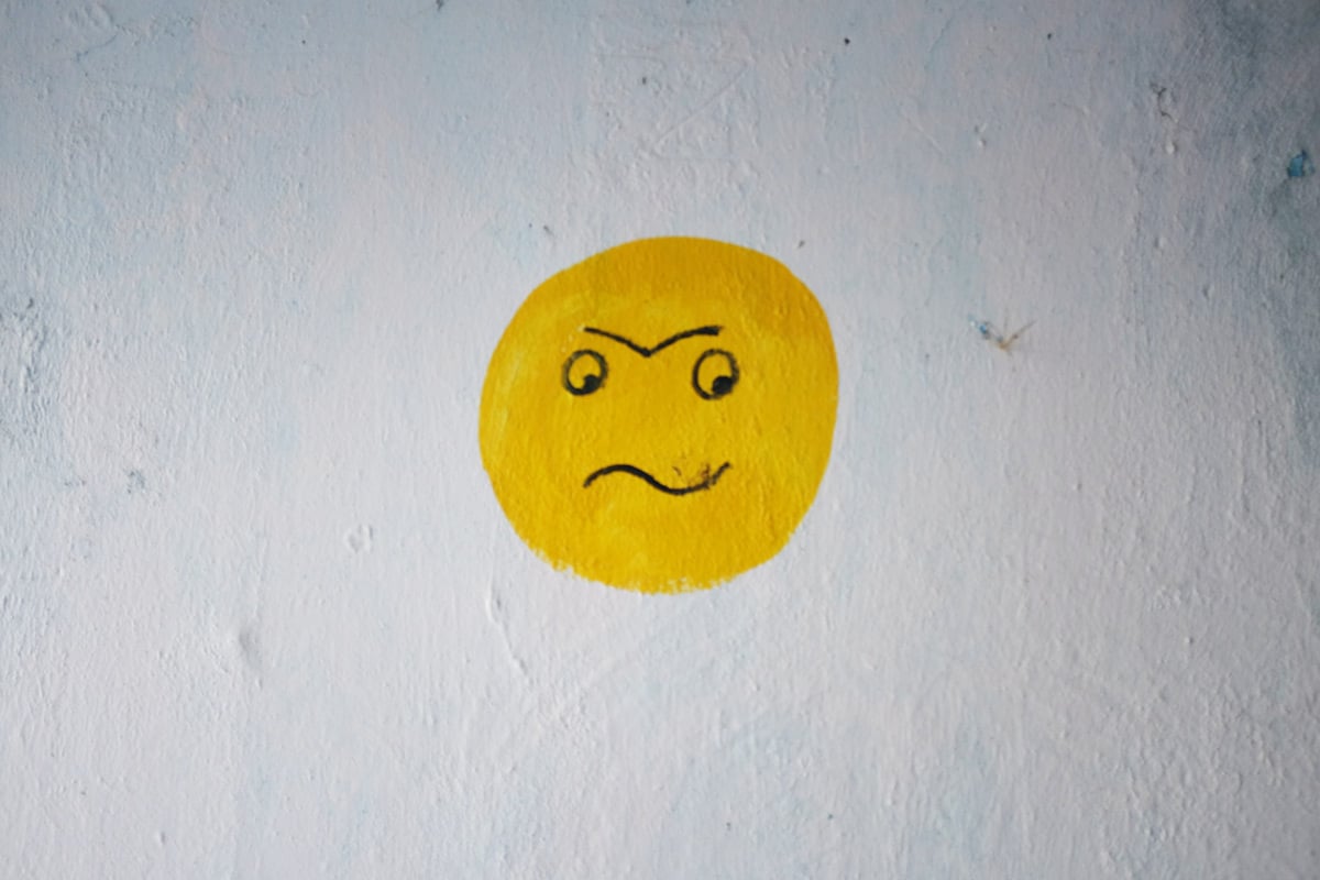 Why do men use fewer emojis than women?