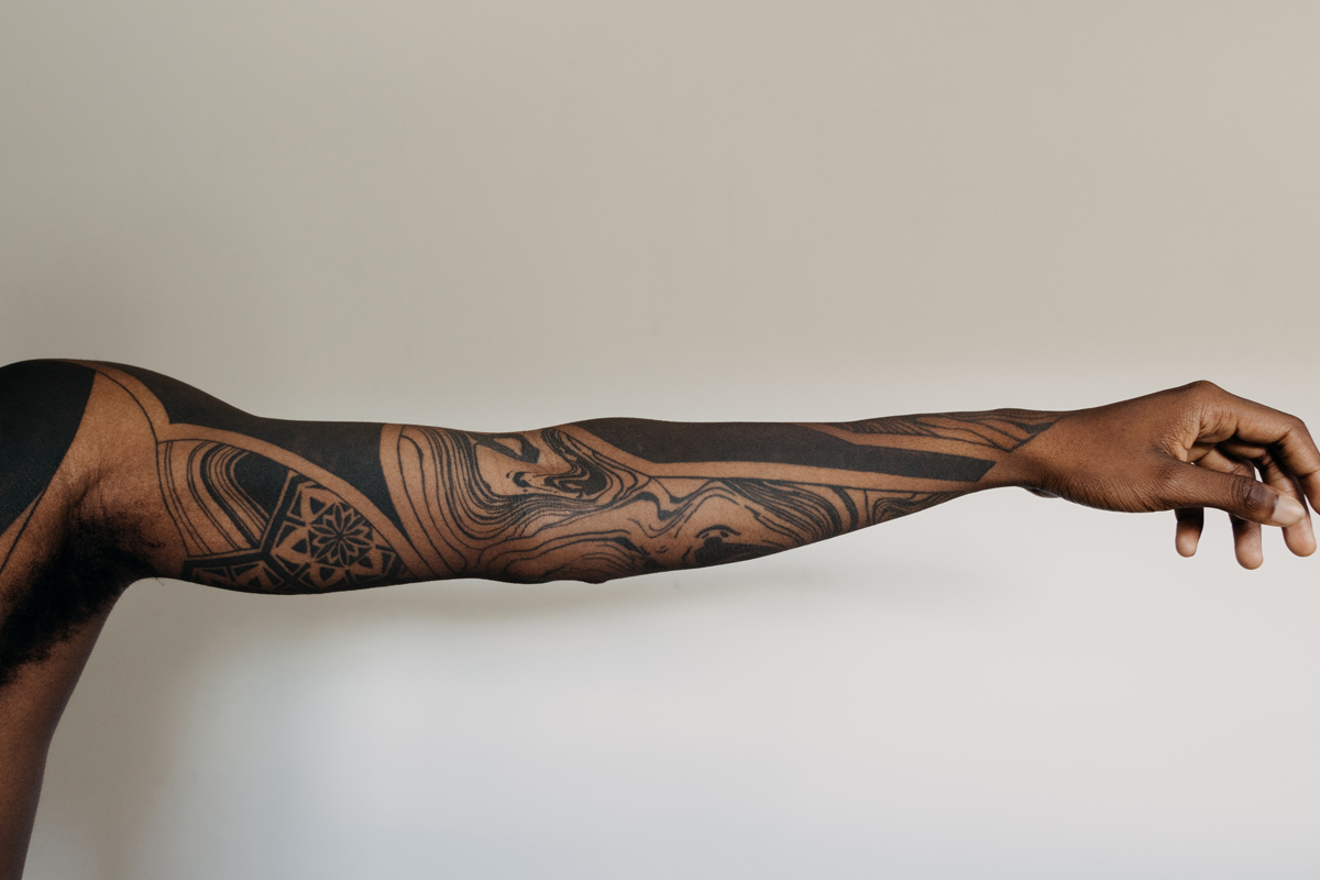What is a blackout tattoo? Here's why you should think twice before getting  one - SCREENSHOT