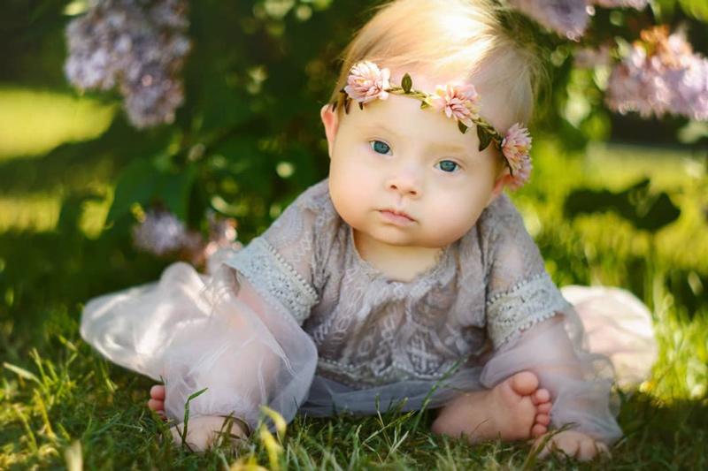 Mother captures AMAZING photographs of her adopted child with Down syndrome