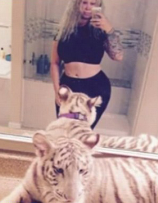 Texas mom once arrested for raising child in house full of tigers faces new charges