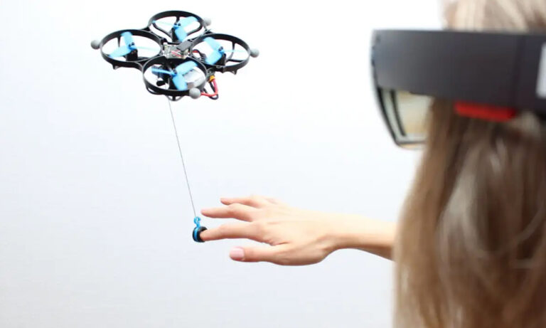 Drones on strings could soon be used to puppeteer VR players into feeling virtual objects