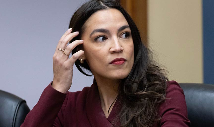 AOC held hands with Joe Biden one time, now sexists are calling her a sell-out